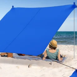 Strandzelt 230 x 200 cm UPF 50+ Sonnenzelt mit Sandankern Sandsäcken und 2 Stützstangen Blau